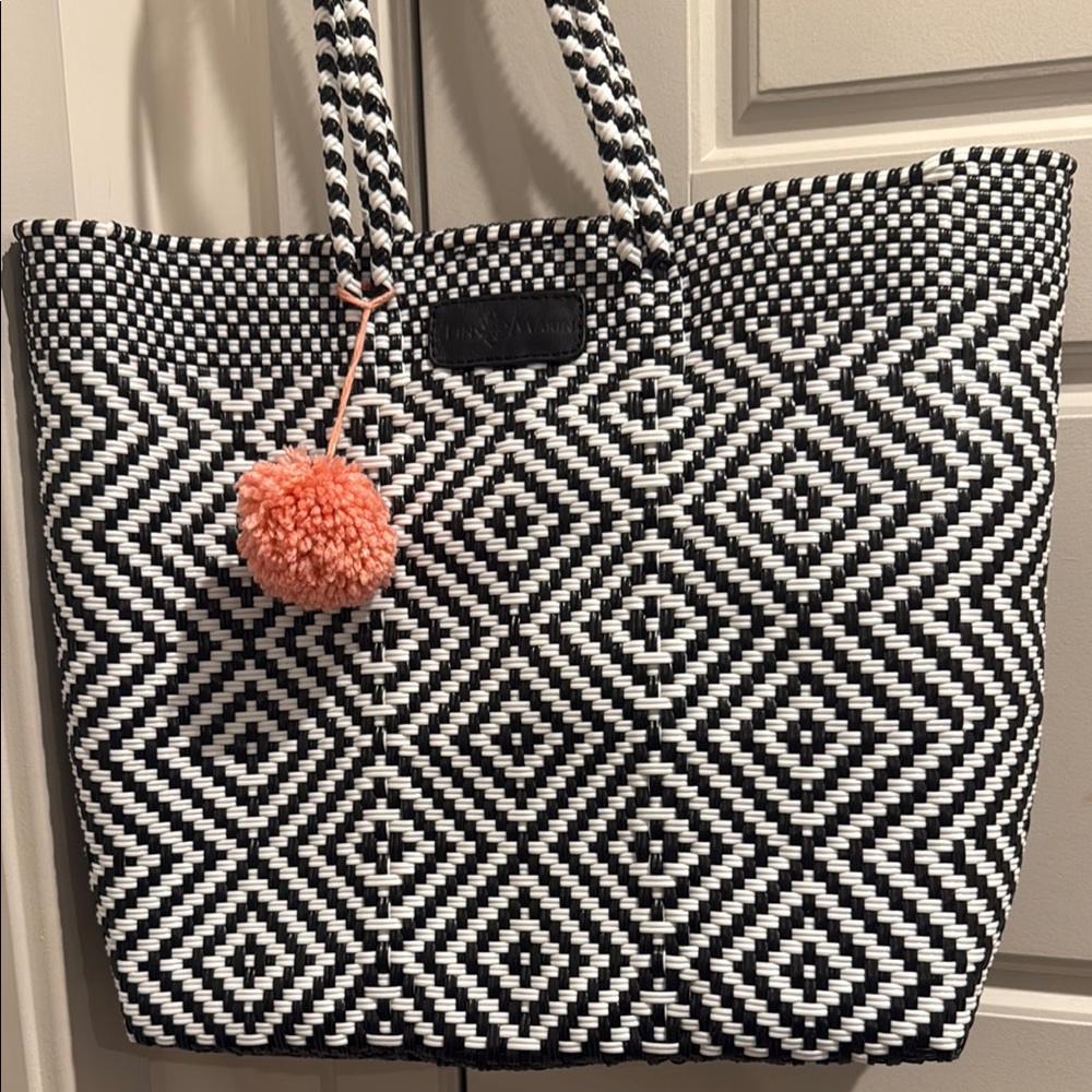Chic Black and White Tote with Pink Accent